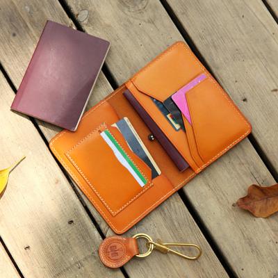 China Original Passport Design Personalized Genuine Leather Women Passport Holder With Elastic Band for sale