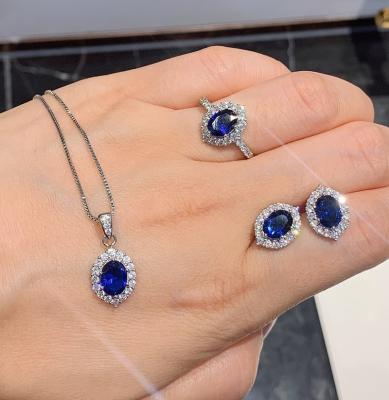 China Trendy Platinum Heart Paraiba Zirocn Necklace Ring Set Girlfriend Heart Pendant Necklace Earrings Blue Women Jewelry for sale