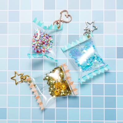 China Wholesalecute Keepsake Gifts Promotion Customized Clear Acrylic Candy Bag Custom Key Chain Glitter Glitter Candy Key Chain Charms For Gift for sale