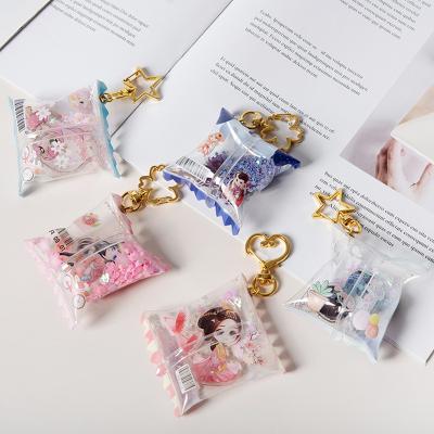 China Souvenir Gifts Wholesale Promotion Candy Key Chain Acrylic Glitter Cute Sequins Customized Clear Custom Candy Bag Charm Key Chain for sale