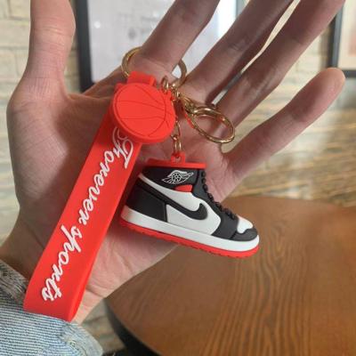 China Souvenirs Promotion Gift Key Chain Customized 2D 3D Silicone Resin Cartoon Figure Key Chain Charm Mini Shoes Custom Sneaker Keychain Charms for sale