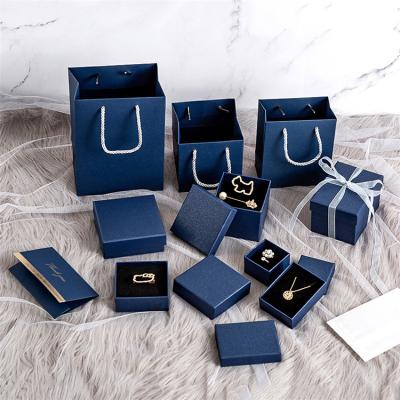 China Handmade Wholesale Stock Custom Navy Blue Paper Jewelry Boxes Ankle Chain Packaging Box for sale