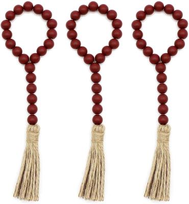 China 100% Handmade Farmhouse Prayer Bead String Wall Hanging Rustic Wooden Accents for Festival Home Decor Wood Bead Garland with Tassels for sale