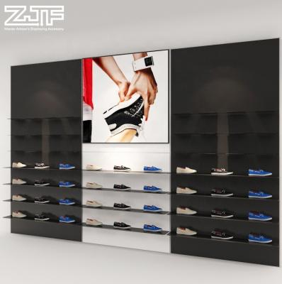 China Eco - Friendly Sports Store Wall Display Rack , Customized Logo Black Slatwall Shoes Display Stands for sale