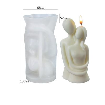 China Aromatic Stocked DIY Family Candle Silicone Mold Lovers Embrace Soap Candle Molds Set for sale