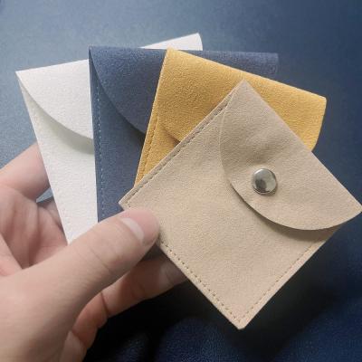 China Jewelry Packaging Custom Logo Jewelery Bag Jewelry Packaging Bags Chic Small Folded Velvet Envelope Flap Suede Microfiber Jewelry Pouch for sale