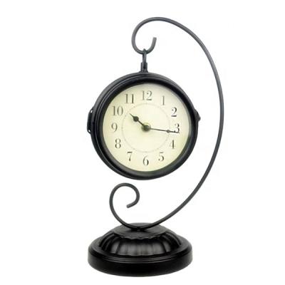 China Antique Style Metal Tabletop Double Sided Clock With Iron Stand for sale