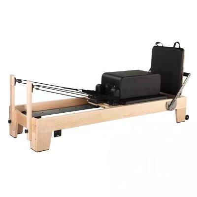 China 2021 Comfortable Solid Maple Wood Yoga Training Home Pilate Reformer With Tower for sale