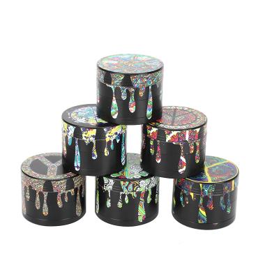 China Zinc Tobacco Grinder 4 Layers With Colorful Printing Design Custom LOGO 40/55 Mm Herb Grinders Black 4 Layers Waterdrop Coating With Sharp Teeth Scraper Wholesale for sale