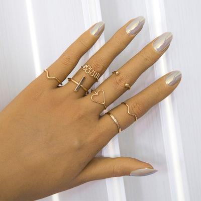 China Romantic hot selling simple European and American style fashion jewelry, love big wave irregular combination 7 piece ring set for sale