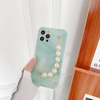 China Anti-drop watercolor oil painting phone case for iPhone 12 wristband case with bracel for sale