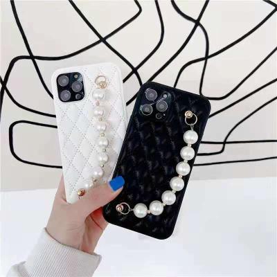 China 2021 New Anti-fall Leather Diamond Leather Pattern With Chain For iPhone12Pro Max Cell Phone Case for sale