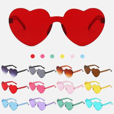 China Candy Heart Shaped Oversized Rimless Sunglasses Color Fashion Transparent Frameless Glass Eyewear Party High Quality Sunglasses for sale