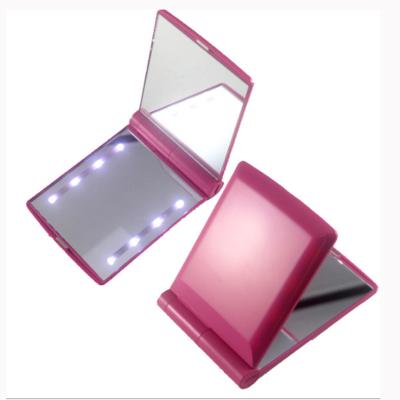 China Pocket Lighted Mirror Light Up Travel Mirror Mini Makeup Mirror with 8 LED and Battery for sale