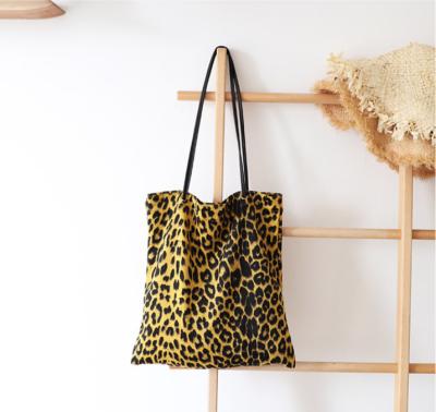 China Khaki Yellow Reusable Leopard Print Shopping Bag The Casual Handbag Tote Shoulder Bag For Women With Retro Thin PU Leather Shoulder Strap for sale