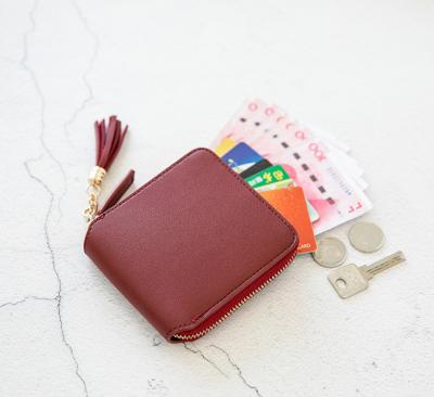 China Small soft cute tassel coin purse with tassel for girls, PU leather change purse with tassel for girls for sale