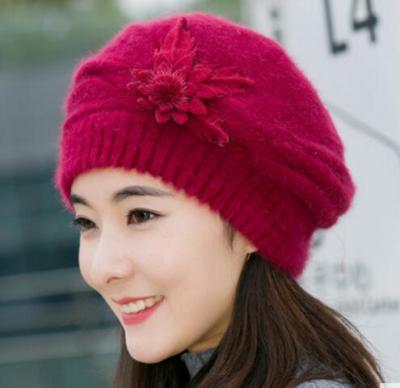 China Women Winter Flower Hat Bow Ear COMMON Hat Braided Knitted Hat for sale