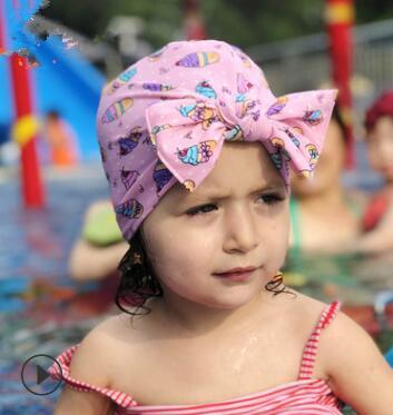 China Cute Cartoon Cute Children's Swim Cap Kids Acrylic Bow Hat Girls Headwear Baby Elastic Solid Color Print Baby Hat for sale