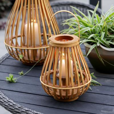 China New Environmental Protection Bamboo Lanterns Decorative Windproof Candle Lamp Ornaments Home Stay Wind Log Rattan Floor Lantern Candle Lantern for sale