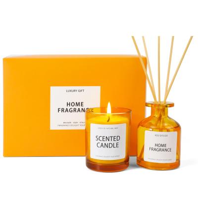 China New custom logo desing wedding home decor decoration orange glass aromatherapy scented reed soy candles diffuser for luxury gift set for sale