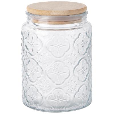 China Viable Vintage Presbyopia Kitchen Glass Storage Jars With Lid Bamboo Candy Food Storage Jar for sale