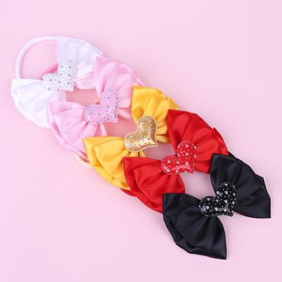 China Sweet Children's Nylon Bow Headband Baby Solid Color Three-Layer Bow Love Headband for sale