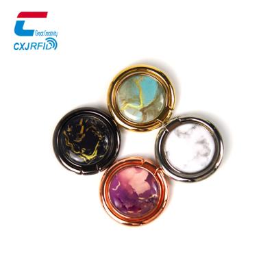 China Hot Selling Waterproof/Waterproof 360 Degree Metal NFC Phone Ring Stick NFC Phone Holder Social Media Tag Sticker for sale