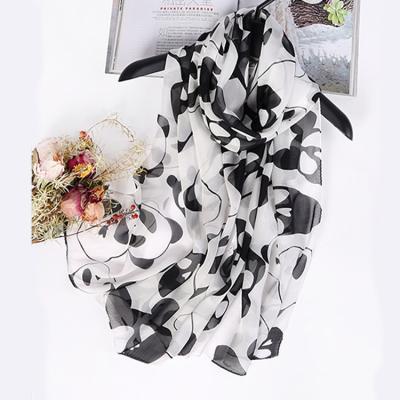 China OEM luxury soft elegant white and black chiffon hijab print panda long silk shawl for sale