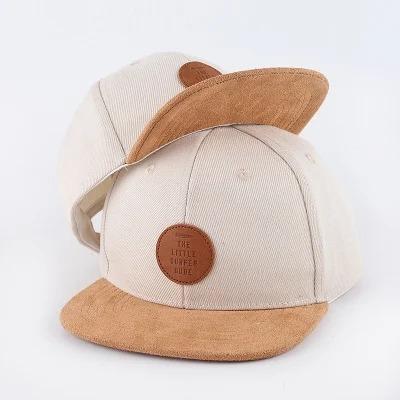 China JOINT Custom Brim Kids Hat Six Panel Suede Cotton Patch Leather Snapback Hat for sale