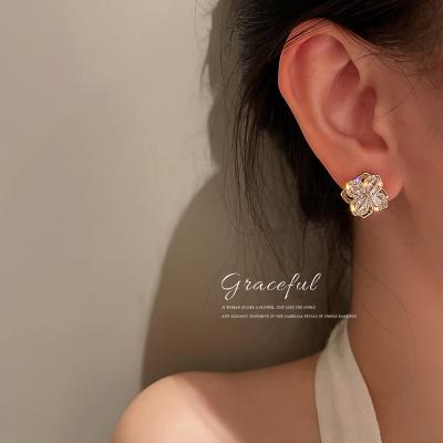 China TRENDY Real Gold Plated Rotating Fashion Rhinestone Flower Earrings for sale