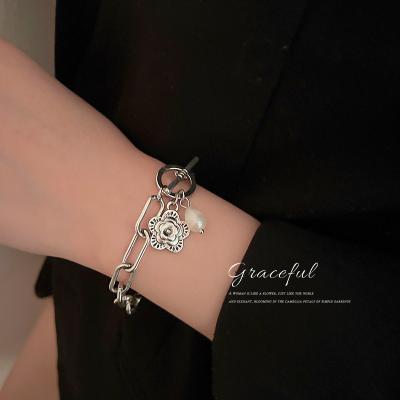 China FASHIONABLE Pearl Drop Flower Fashion Adjustable Chain Bracelet for sale