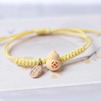 China FASHIONABLE Cartoon Dinosaur Squash Bracelet Playful Girlfriend Students Hand Knitting Adjustable Bracelet for sale