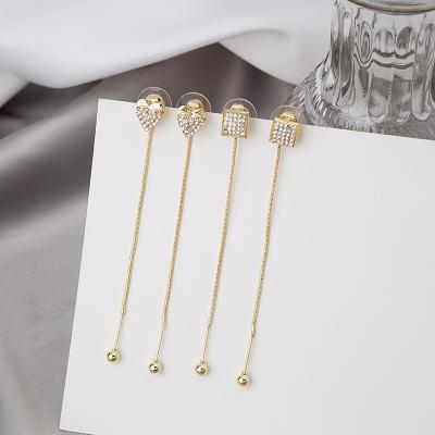 China TRENDY Trendy Fashion Dangle Rhinestone Heart Earrings Gold for sale