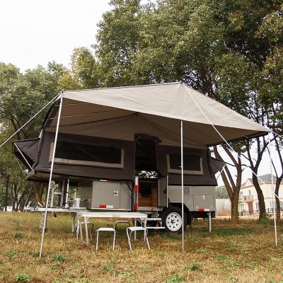 China Car Roof Top Travel Trailer China Factory Camping Trailer Top Block Fiberglass Canvas Tent for sale