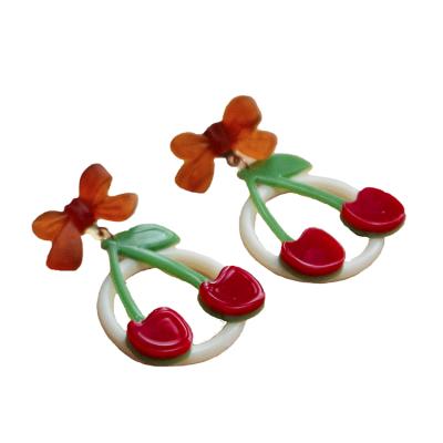 China 2021 CLASSIC INS trend wild cherry bow cherry vitality girl hollow round earrings for sale