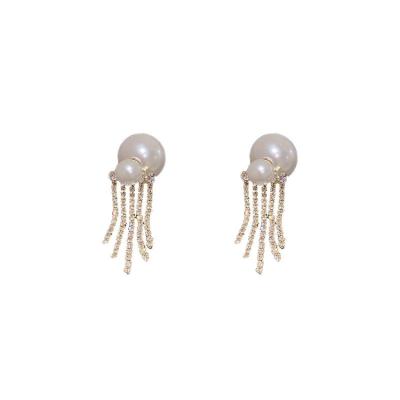 China New design two FASHIONABLE pearl tassels short high sense fashion female wearing earrings for sale