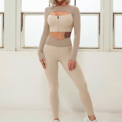 China Breathable Yoga Wear Women Long Sleeve Front Zipper Hip Lifting Leggings Set Hollow High Waist Fitness Women Yoga Set for sale