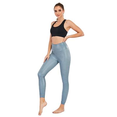 China Wholesale Women Shiny Yoga Leggings Breathable Sports Liquid Running Tights Pants With Side Pockets for sale