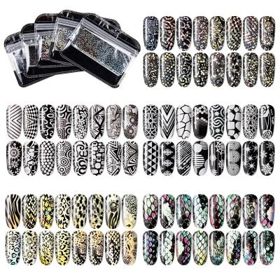 China Plastic Holographic Glossy Manicure Nail Transfer Stickers 16pcs/Package Scale Leopard Pattern Tips Design Manicure Decoration 4*20cm for sale