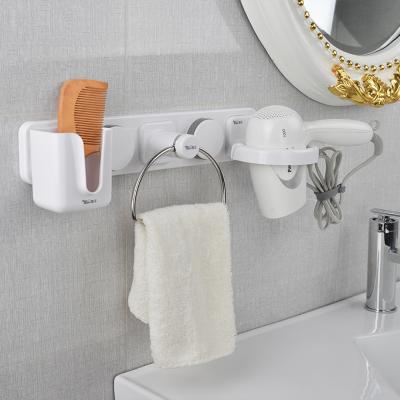 China Contemporary Multifunctional Wall Mounted Towel Ring Bathroom Wall Storage Organizer Hair Dryer Holder for sale