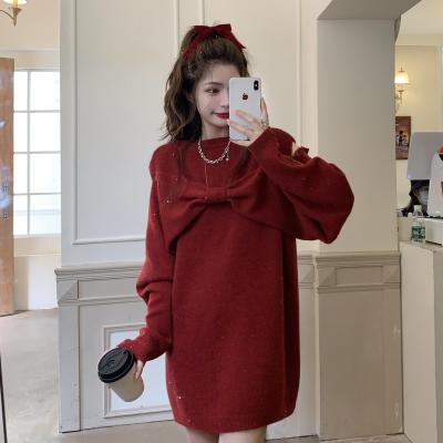 China New Christmas bow-knot permeable shoulders autumn and winter anti-static mid-length women's sweater lazy wind wild skirt knit sweater dress for sale