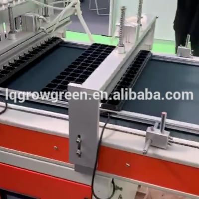 China Green home GGSCX automatic seeder machine to sow seed in trays with high precision and speed up quickly into 750 trays per hour for sale