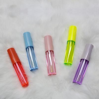 China Cosmetic Wholesale Custom Colorful Lip Gloss Tubes Round Shape Lip Gloss Containers Tube With Wand Plastic Lip Gloss Cosmetic Packaging for sale