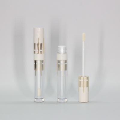 China Wholesale Cosmetic In Stock White Round Shape Lip Gloss Tubes Empty Lip Gloss Container Tube With Magic Wand For Cosmetic Packaging for sale