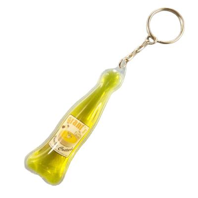 China Custom Promotion PVC Liquid PVC Oil Pendant Key Chain , Entry Oil PVC Key Chain for sale