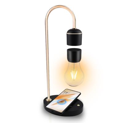 China Modern Hot Sale Lamp Creative Floating Levitating Magnetic Lamp With Wireless Charger for sale