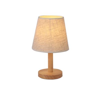 China Modern Modern Edison Bulb Hotel Bedroom Lamp Bedside Solid Wood Fabric Shade Table With Switch for sale