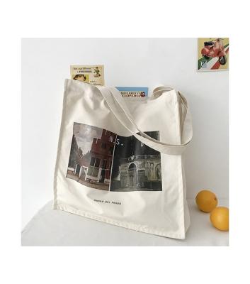 China Eco - Friendly Paper Bag Manufacturer White Luxury Customize Logo Printed Paper Shopping Bags for sale