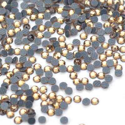 China DMC factory flat back rhinestone thin nail yellow crystal wholesale custom direct flat stick rhinestone for sale