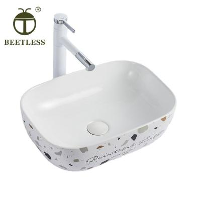 China Modern Nordic Style Bathroom Sinks Rectangular Over Counter Porcelain Vessel Vanity Sink Ceramic Color Stain Art Basin for sale